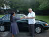 Sr. Mayet receiving the keys from Bishop Quinn